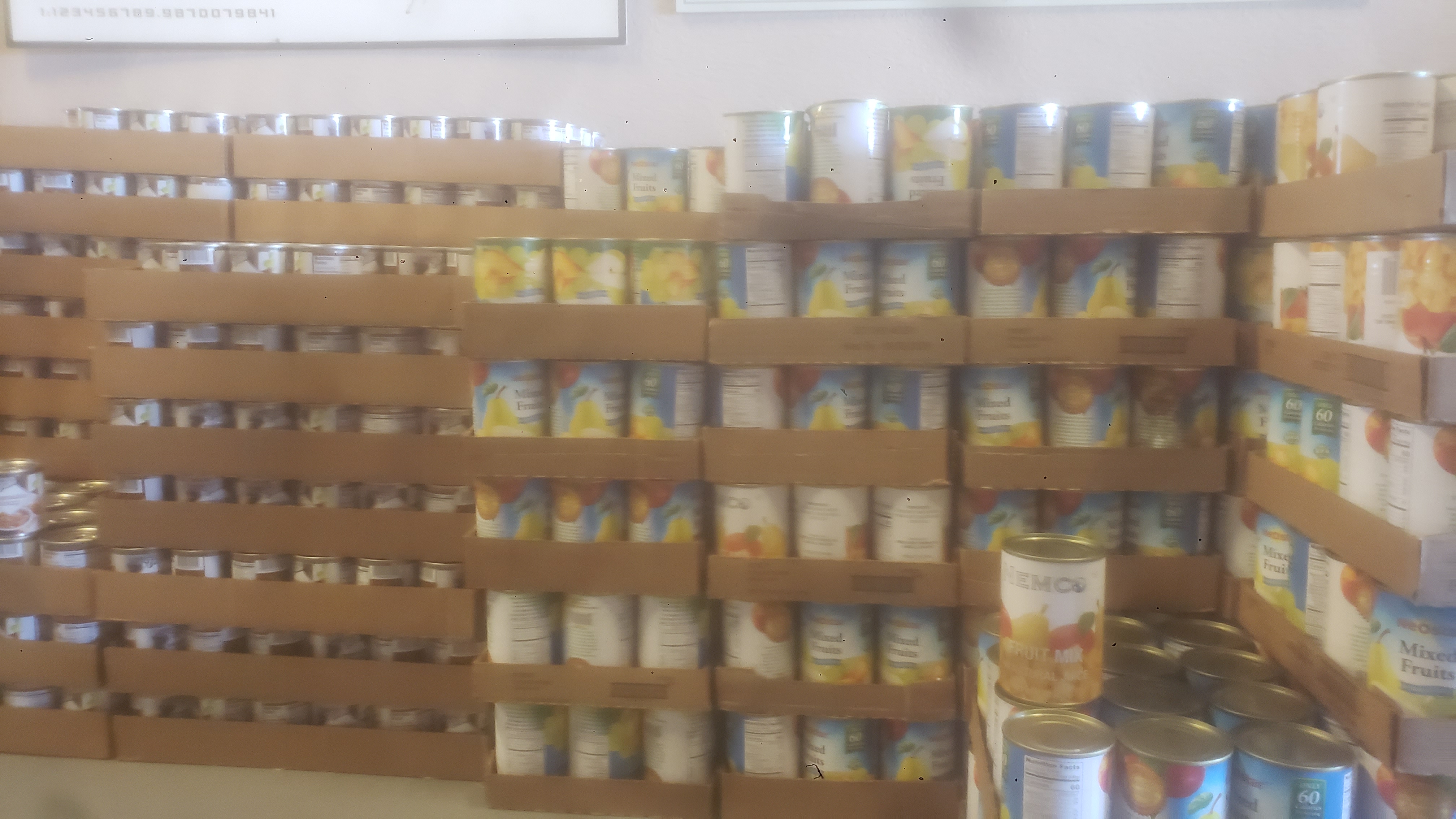 Stack of cans on trays.
